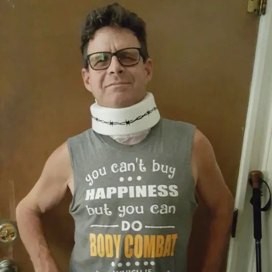 BODYCOMBAT Instructor Max Dorsey with sling